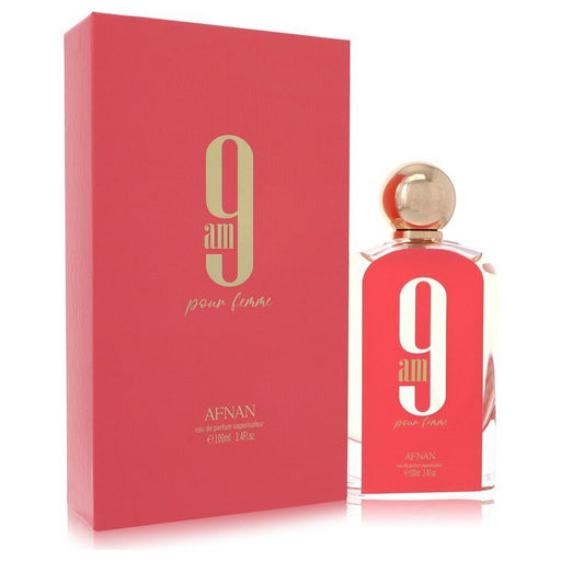 Afnan 9am Pour Femme Eau De Parfum spray in 3.4 oz bottle, featuring a sleek design and floral fragrance for women.